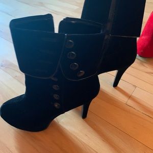 Black boots slightly worn